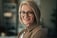 Mature woman wearing glasses smiling at camera stock photo