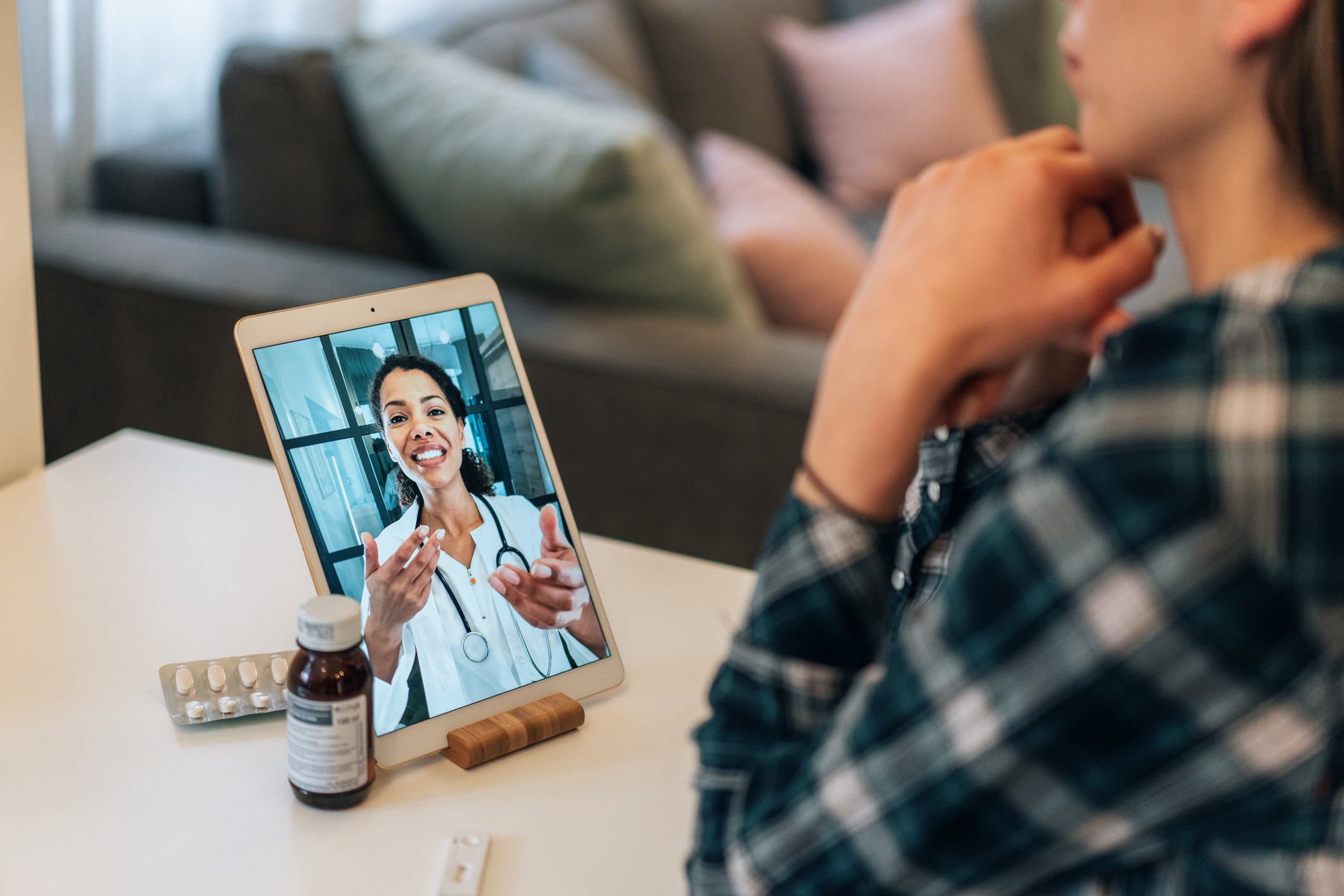 Person Smiling at Computer
